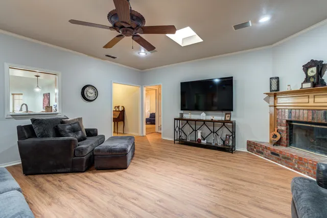 a kitchen with stainless steel appliances granite countertop a sink and a stove