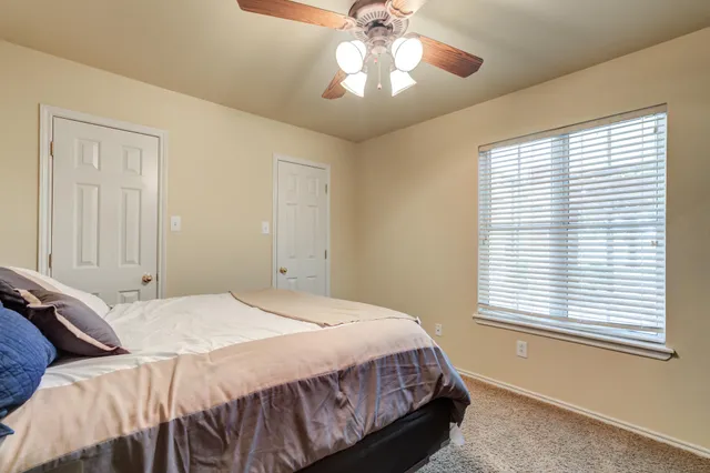 swimming pool with outdoor seating and yard