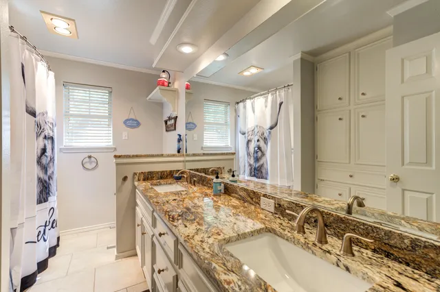 a swimming pool with outdoor seating and yard