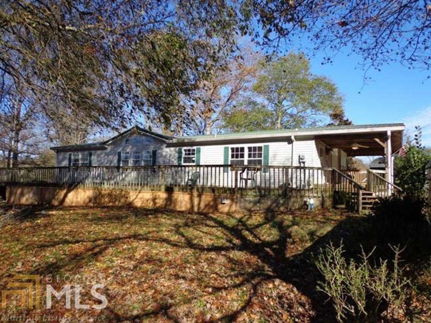 424 Riverbend Road Southeast Commerce, GA 30530 - Photo 1 of 1 a view of house with outdoor space
