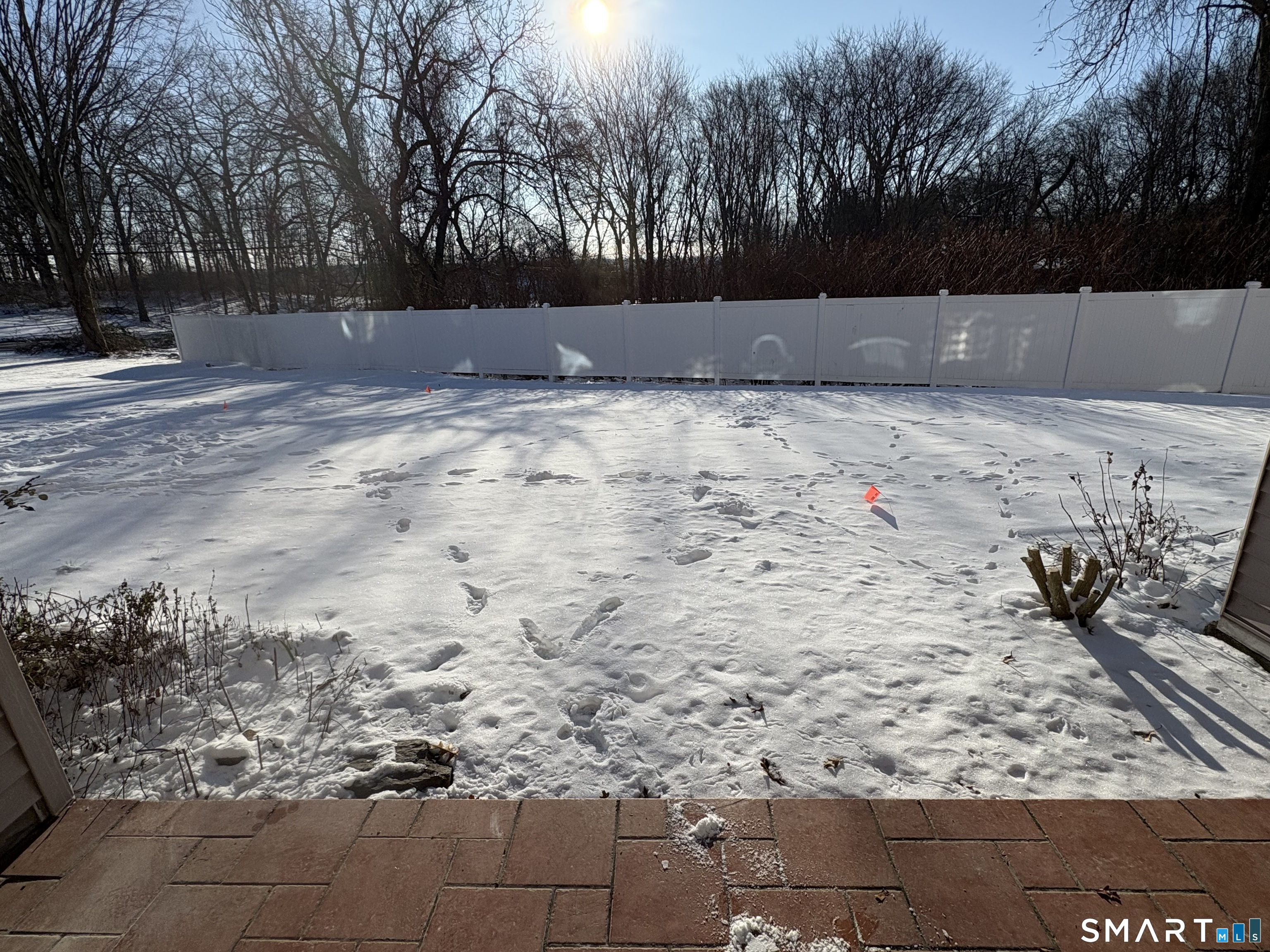 8 Heather Ridge, Unit 8 Shelton, CT 06484 - Photo 12 of 13 a view of wooden fence of a house