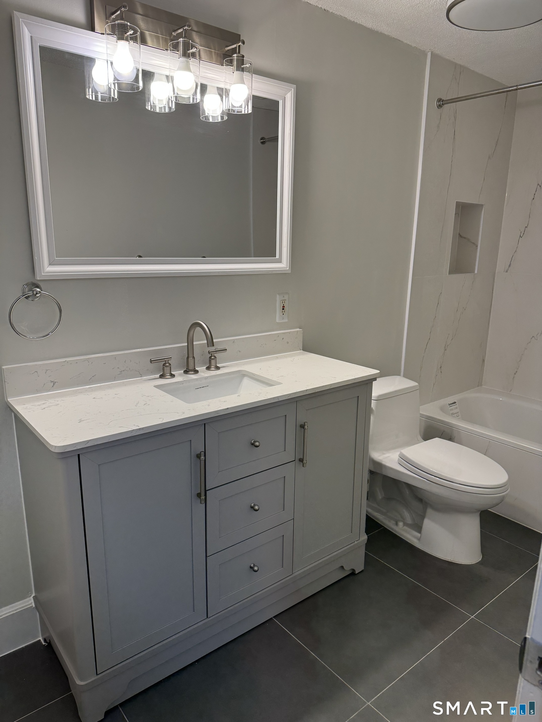 8 Heather Ridge, Unit 8 Shelton, CT 06484 - Photo 9 of 13 a bathroom with a toilet sink and mirror
