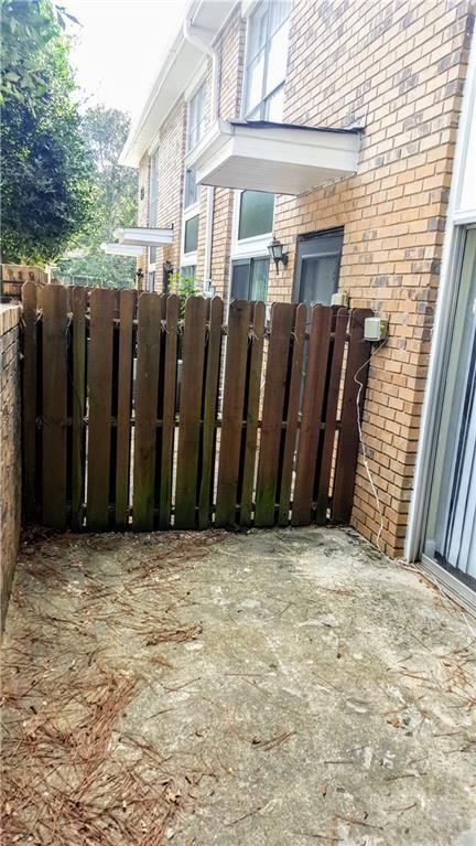 4701 Flat Shoals Road, Unit 68D Union City, GA 30291 - Photo 13 of 14 a view of wooden fence