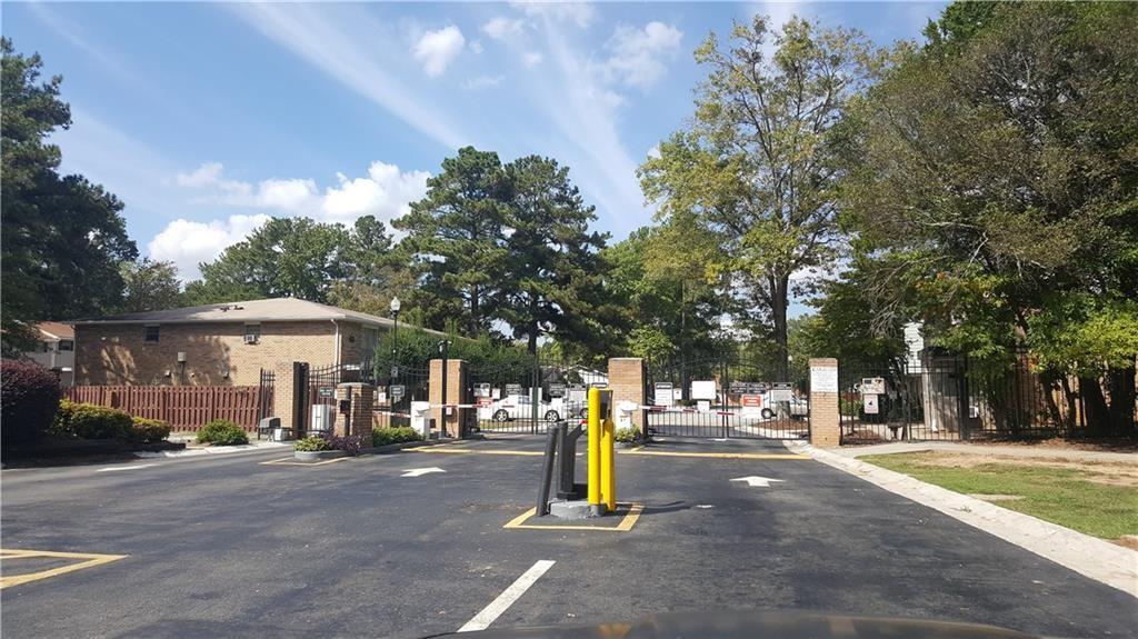 4701 Flat Shoals Road, Unit 68D Union City, GA 30291 - Photo 2 of 14 a view of a park with swings and slides