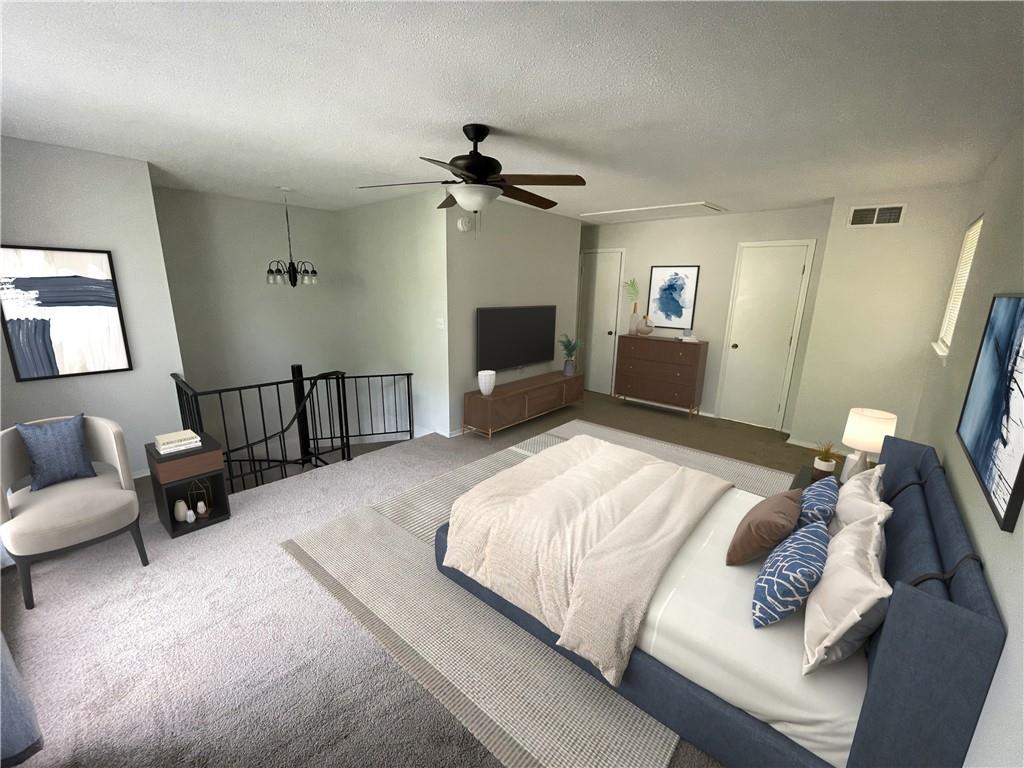 4701 Flat Shoals Road, Unit 68D Union City, GA 30291 - Photo 9 of 14 a bedroom with a bed and a couch
