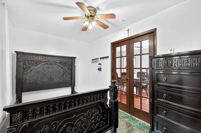 a bathroom with a double vanity sink a mirror and a shower