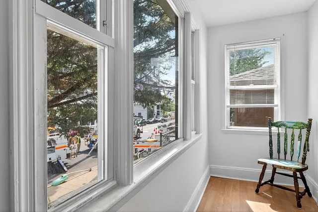 a view of a room with a window and outside view
