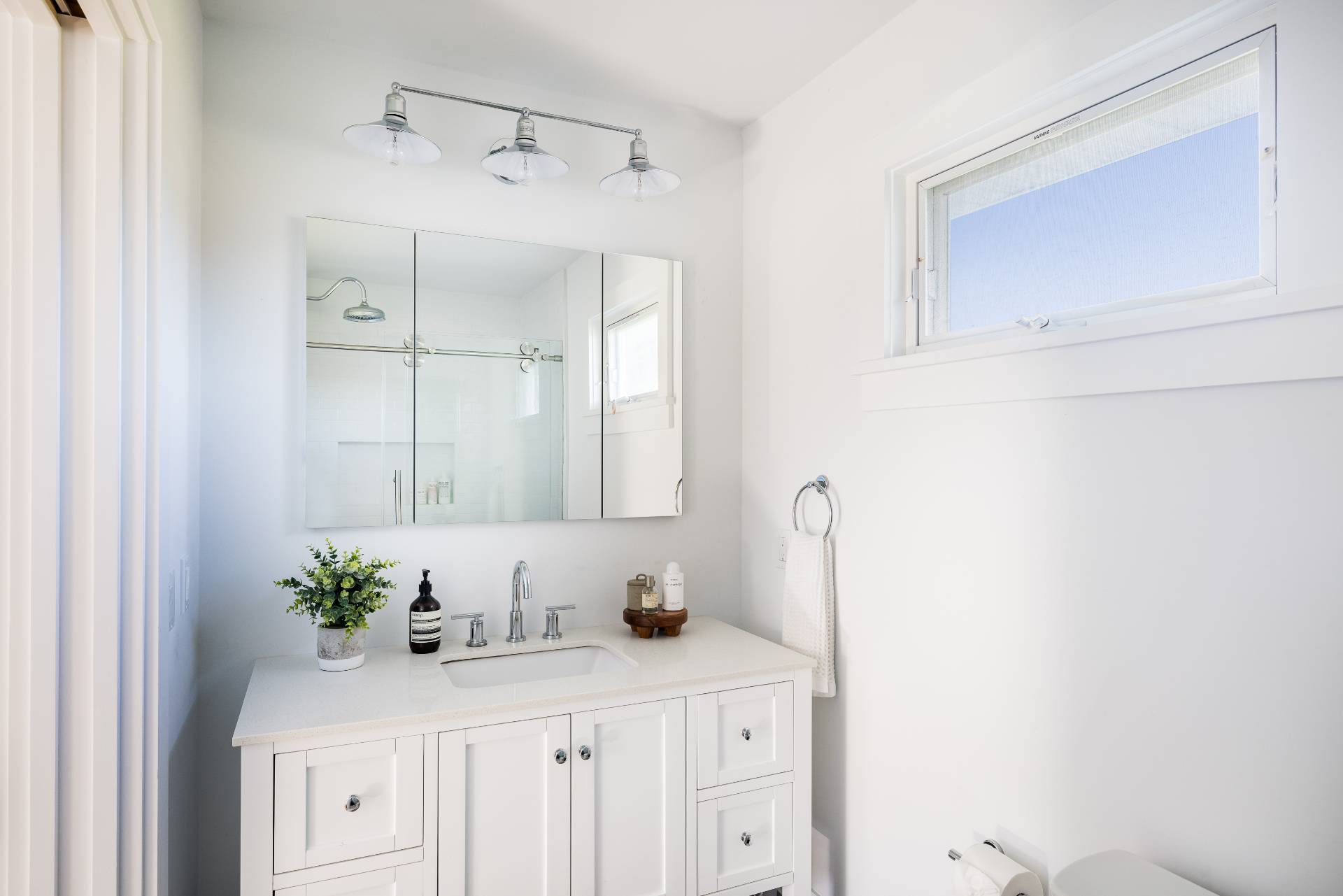 21 Thistle Patch Lane Sag Harbor, NY 11963 - Photo 7 of 17 a bathroom with a sink a vanity and a mirror