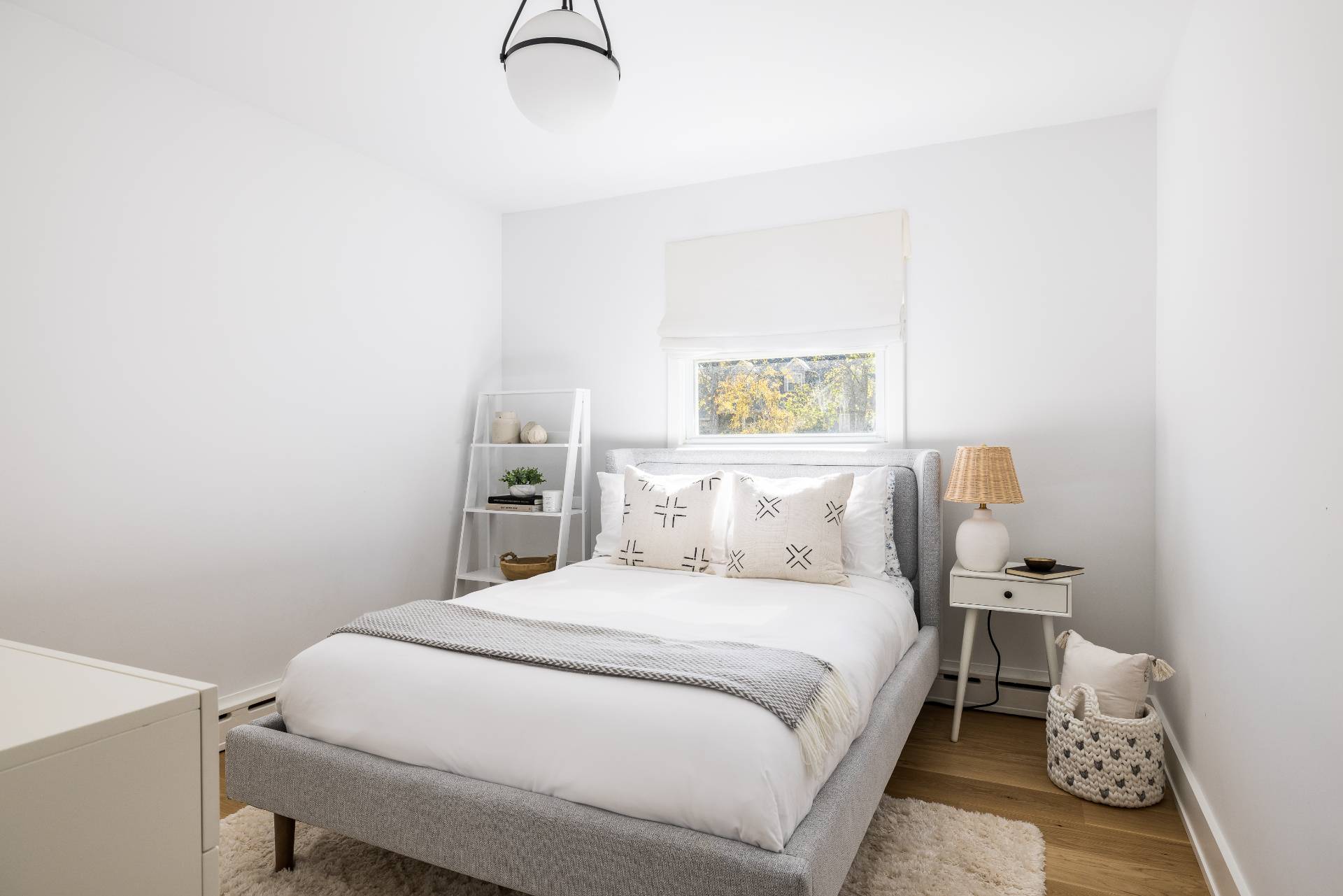 21 Thistle Patch Lane Sag Harbor, NY 11963 - Photo 9 of 17 a bedroom with a bed and a table