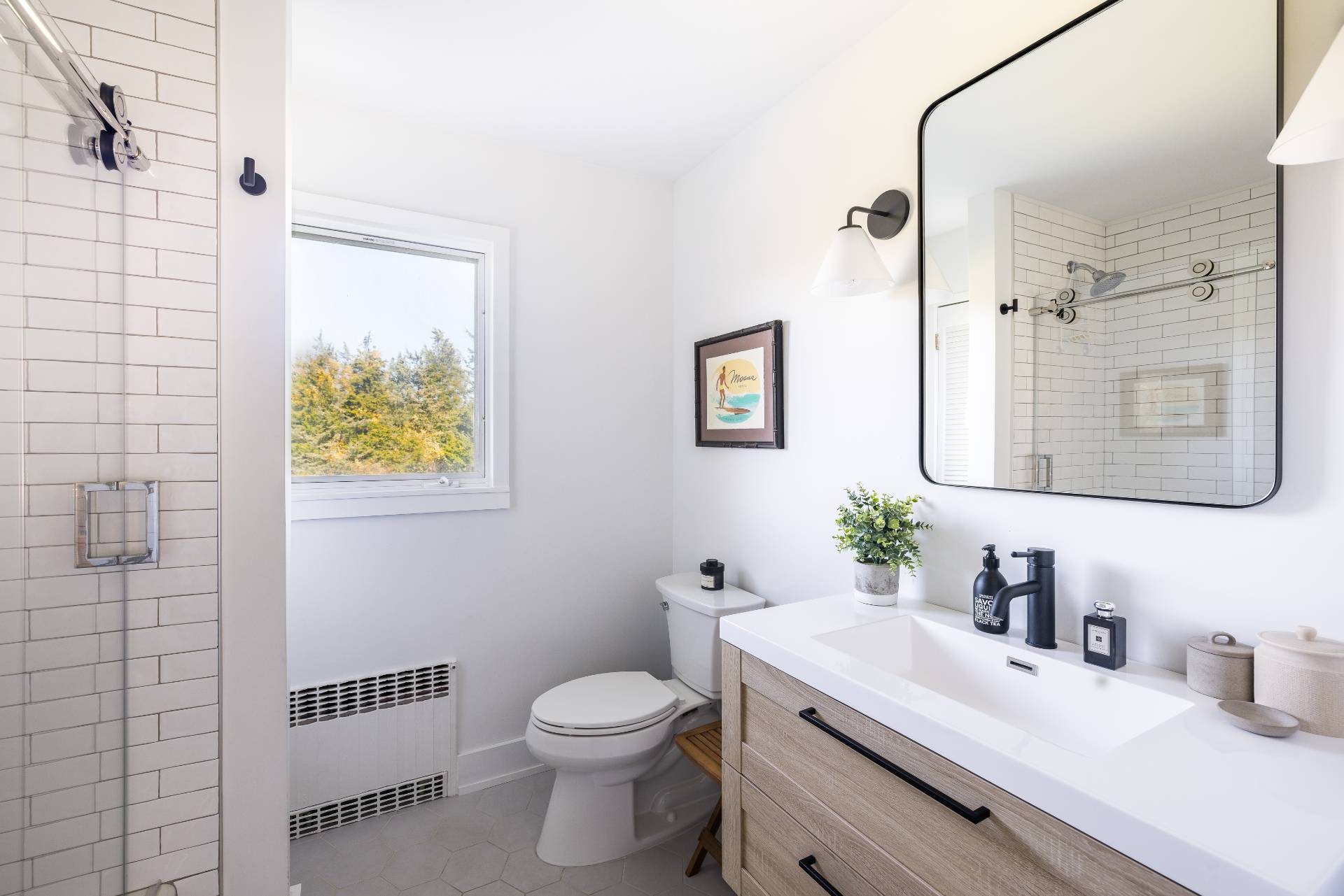 21 Thistle Patch Lane Sag Harbor, NY 11963 - Photo 10 of 17 a bathroom with a granite countertop toilet sink and mirror