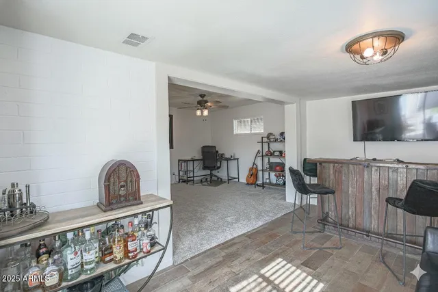 a view of a livingroom with furniture