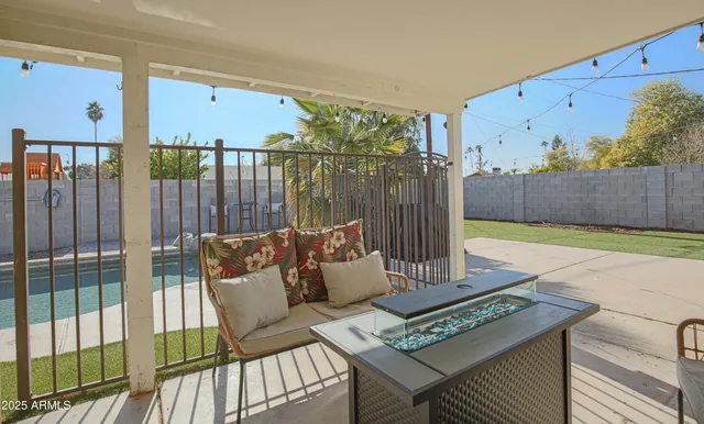 a view of a couches with wooden floor