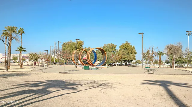 a view of a road with a building in the background