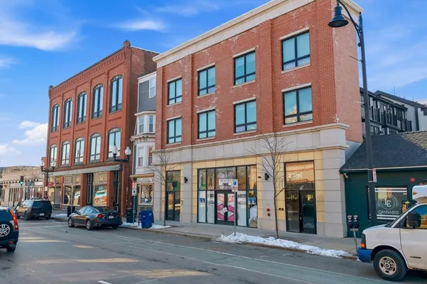 a view of a building on a street