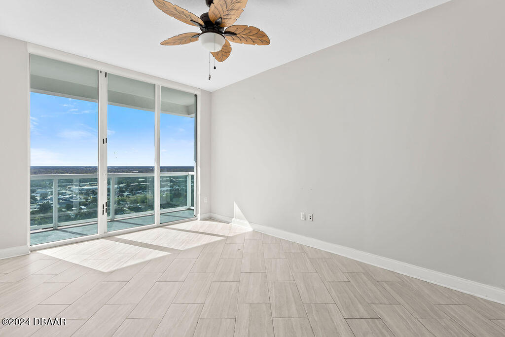 241 Riverside Drive, Unit 2610 Daytona Beach, FL 32117 - Photo 15 of 31 a view of an empty room with a window