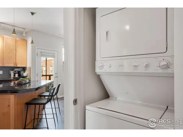 a bathroom with a toilet a sink and a mirror