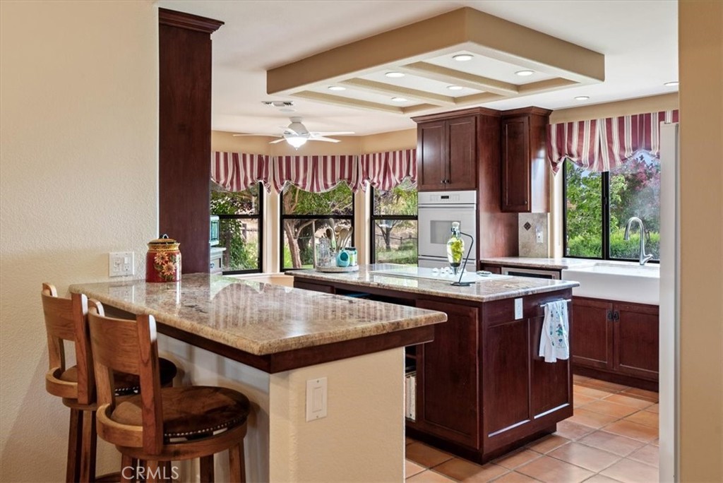 2955 San Fernando Road Atascadero, CA 93422 - Photo 13 of 62 a kitchen with a stove and a refrigerator