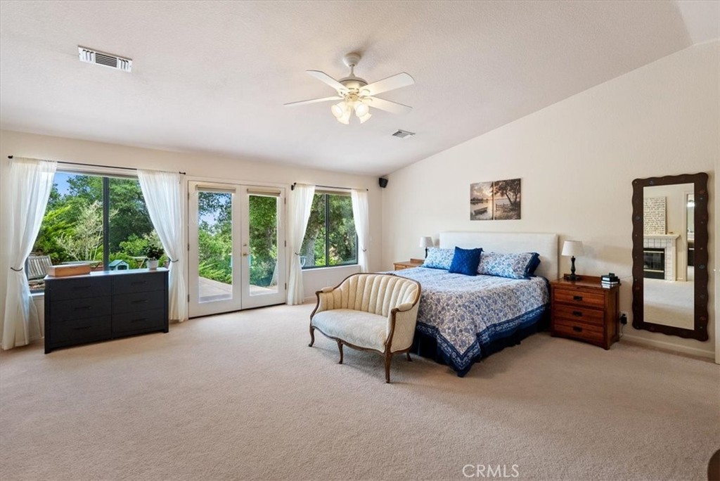 2955 San Fernando Road Atascadero, CA 93422 - Photo 24 of 62 a spacious bedroom with a bed and a couch
