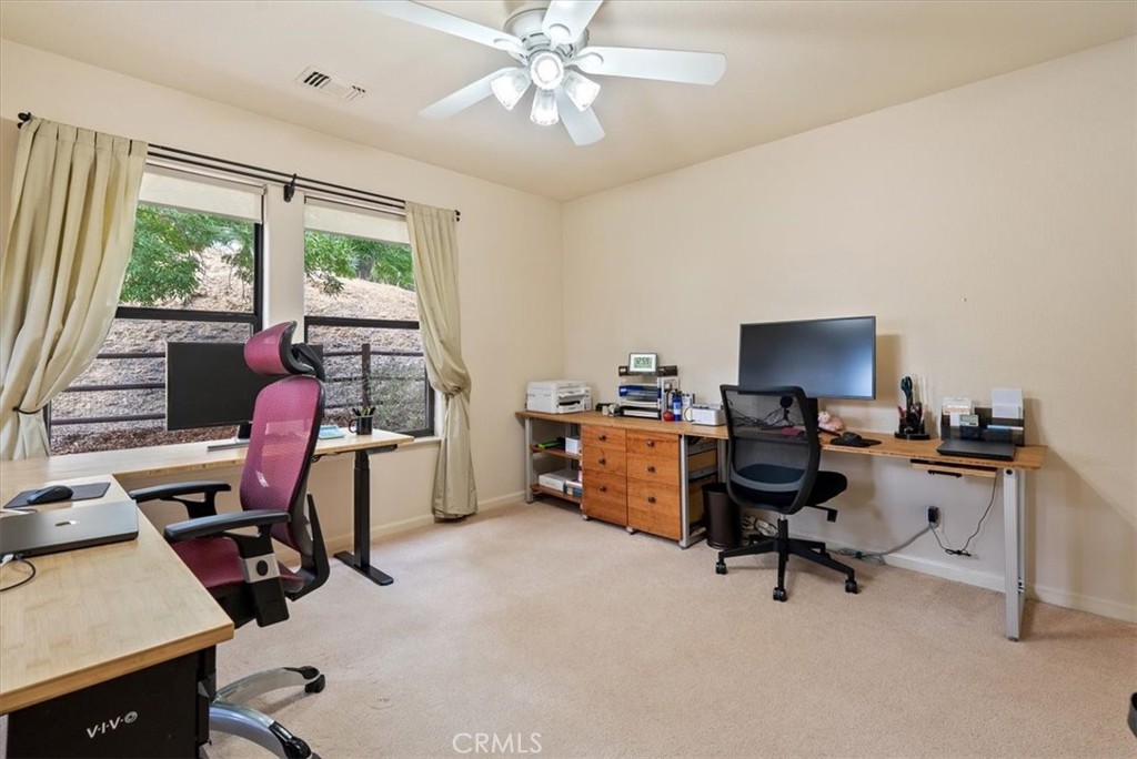 2955 San Fernando Road Atascadero, CA 93422 - Photo 34 of 62 a view of a workspace with furniture and a window