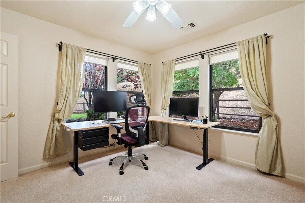2955 San Fernando Road Atascadero, CA 93422 - Photo 35 of 62 a view of a workspace with furniture and a window