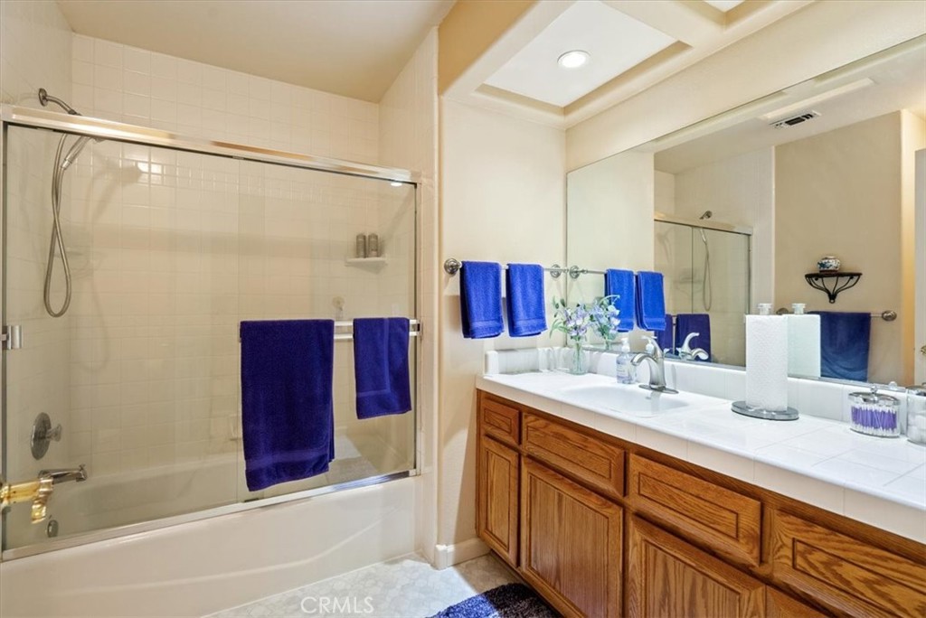 2955 San Fernando Road Atascadero, CA 93422 - Photo 36 of 62 a bathroom with a double vanity sink and mirror