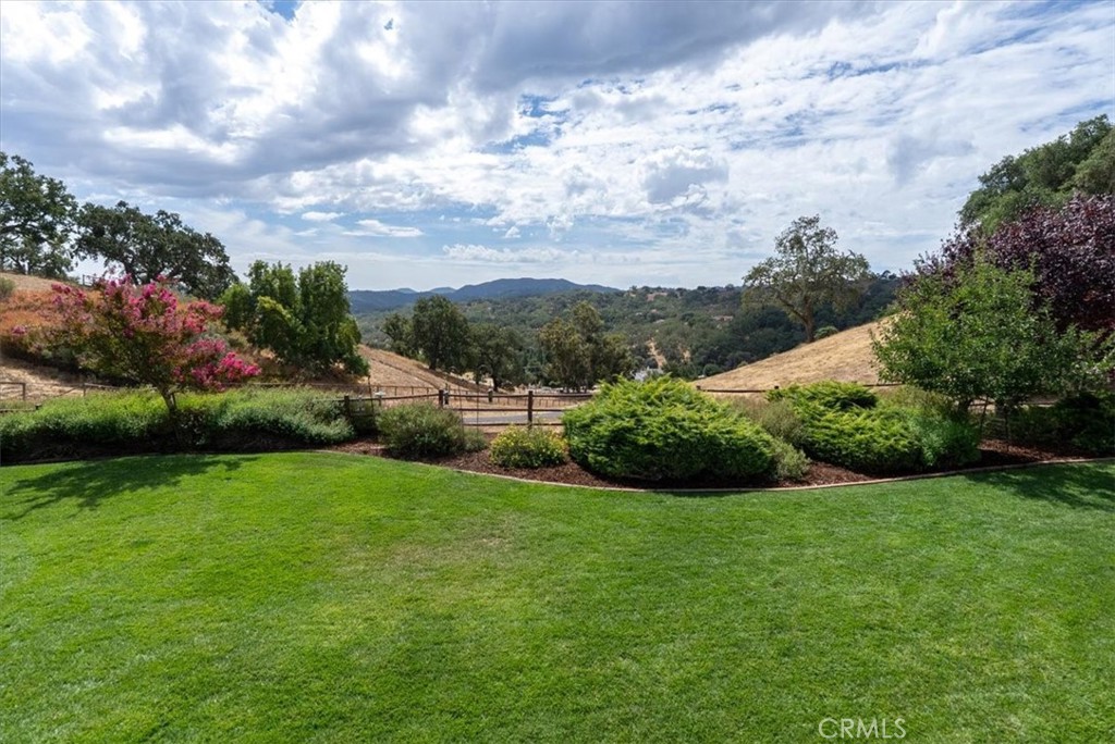 2955 San Fernando Road Atascadero, CA 93422 - Photo 52 of 62 a view of a garden with a building in the background