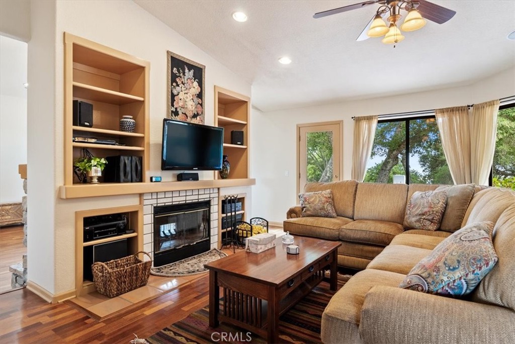 2955 San Fernando Road Atascadero, CA 93422 - Photo 10 of 62 a living room with furniture fireplace and a flat screen tv