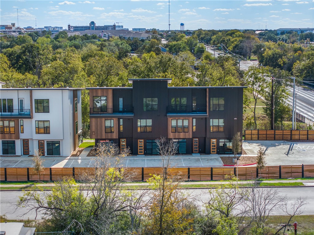 2539 East Villa Maria Road, Unit 11D Bryan, TX 77802 - Photo 1 of 38 a house with swimming pool in front of it