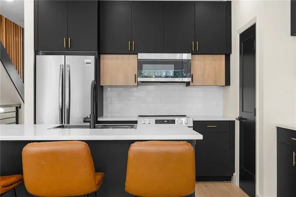 a utility room with two sink