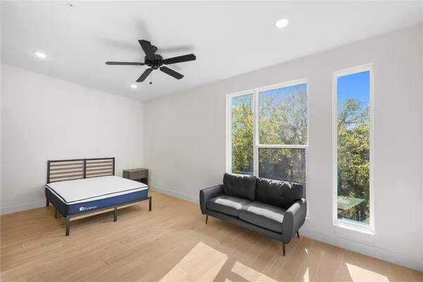 a living room with furniture and a window