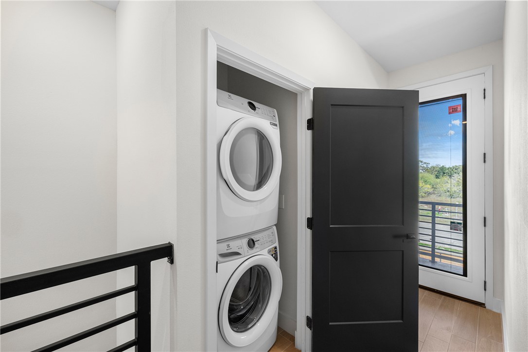 2539 East Villa Maria Road, Unit 11D Bryan, TX 77802 - Photo 24 of 38 a utility room with dryer and washer