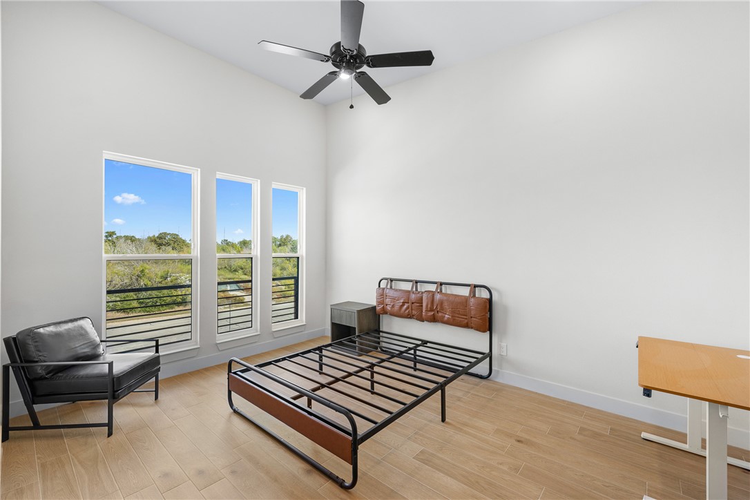 2539 East Villa Maria Road, Unit 11D Bryan, TX 77802 - Photo 25 of 38 a living room with furniture and a window