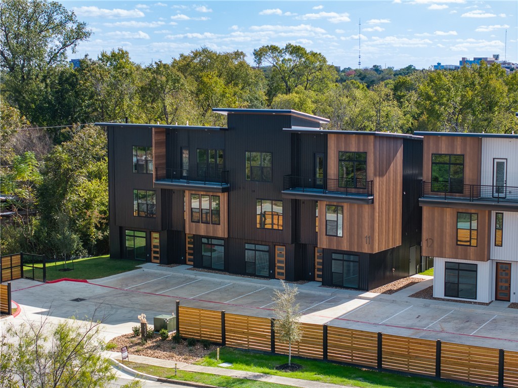2539 East Villa Maria Road, Unit 11D Bryan, TX 77802 - Photo 27 of 38 a front view of a house with a yard