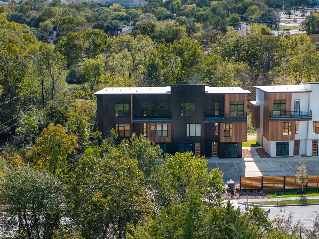 2539 East Villa Maria Road, Unit 11D Bryan, TX 77802 - Photo 3 of 38 an aerial view of a house with a yard balcony