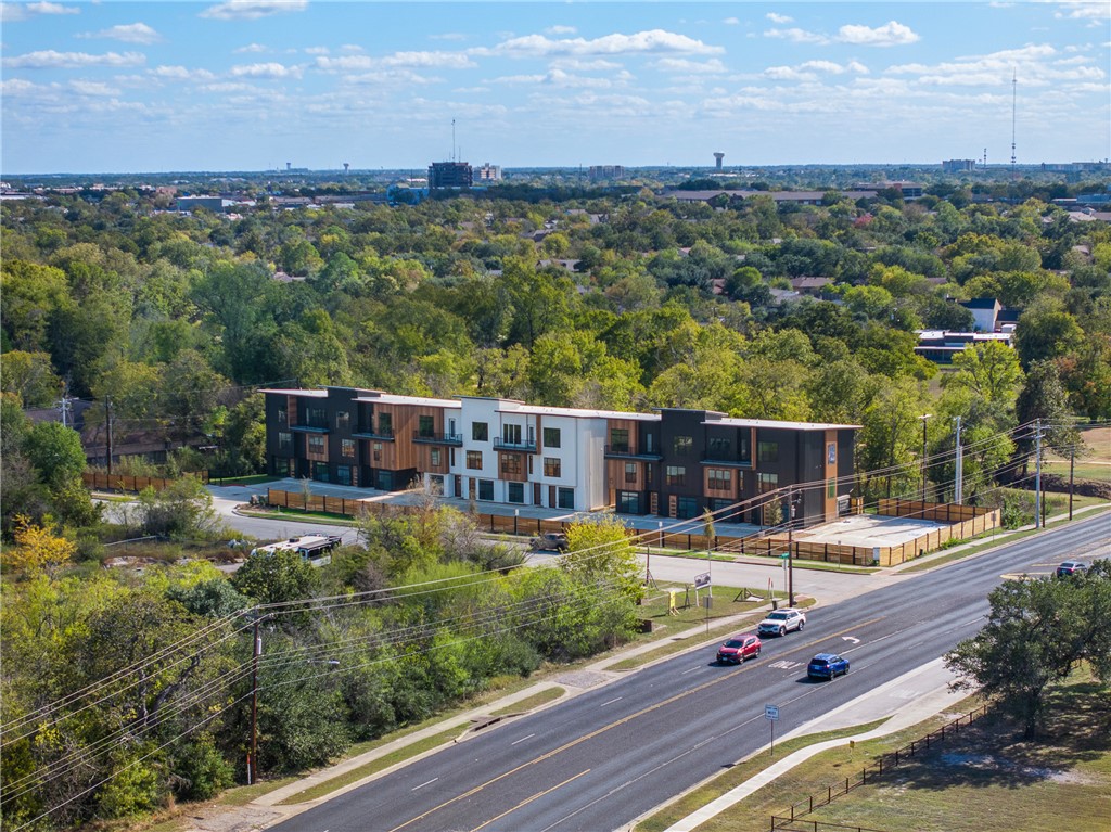 2539 East Villa Maria Road, Unit 11D Bryan, TX 77802 - Photo 33 of 38 an aerial view of a house with a garden