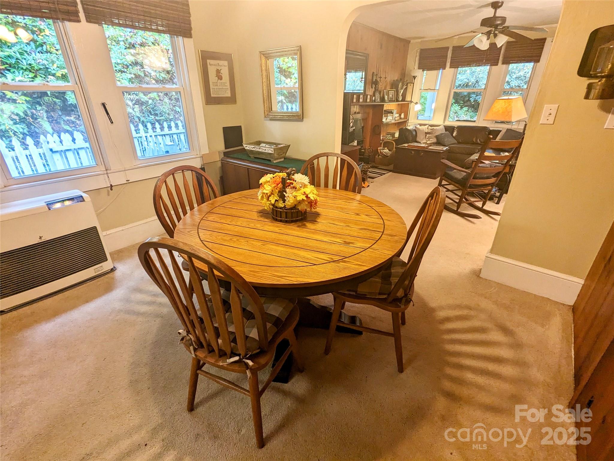46 Tree Farm Road Spruce Pine, NC 28777 - Photo 12 of 40 a dining room with furniture and a large window