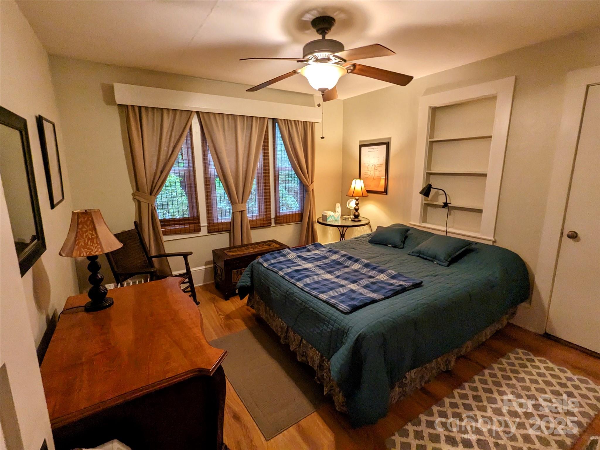 46 Tree Farm Road Spruce Pine, NC 28777 - Photo 19 of 40 a bedroom with a bed window and a table