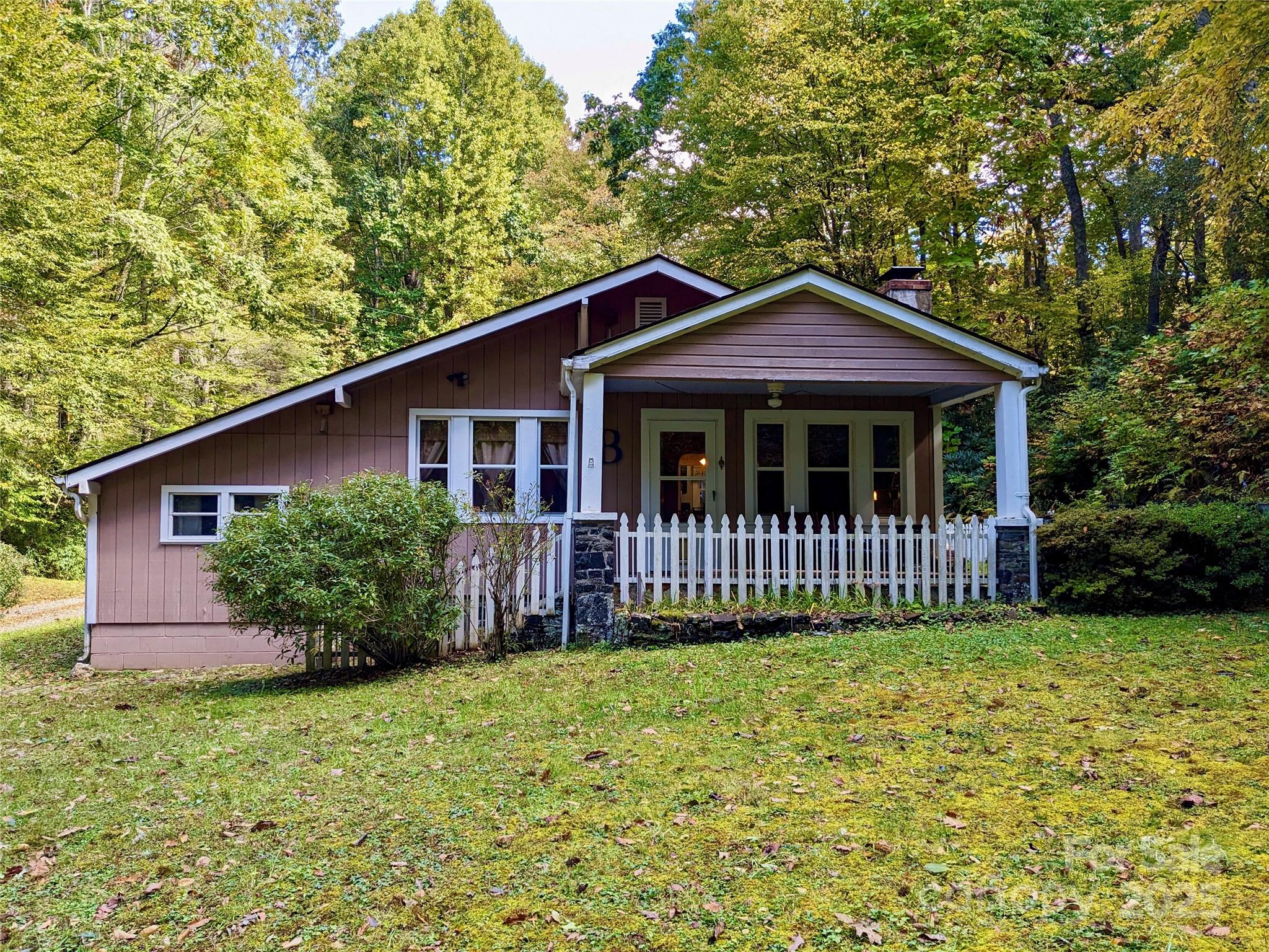 46 Tree Farm Road Spruce Pine, NC 28777 - Photo 40 of 40 a front view of a house with garden