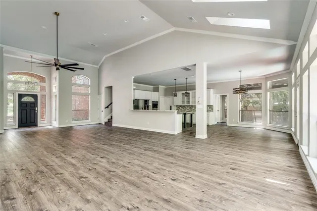 a view of an empty room and window