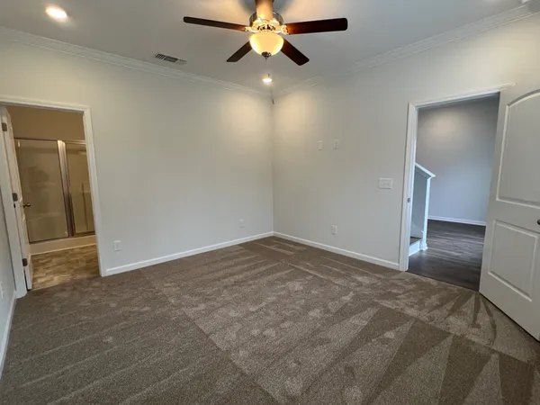 a bathroom with a sink a mirror and a shower