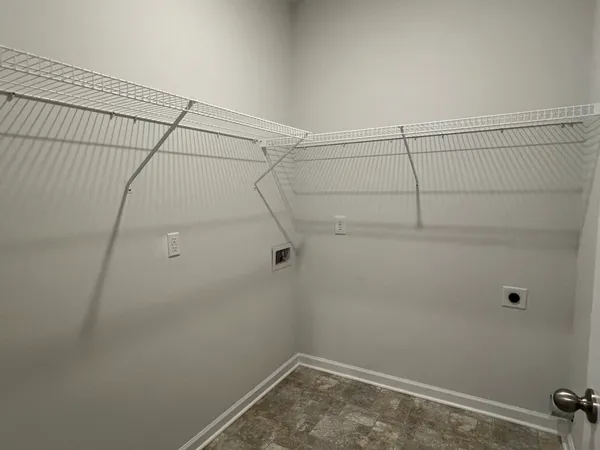 a bathroom with a sink toilet and vanity