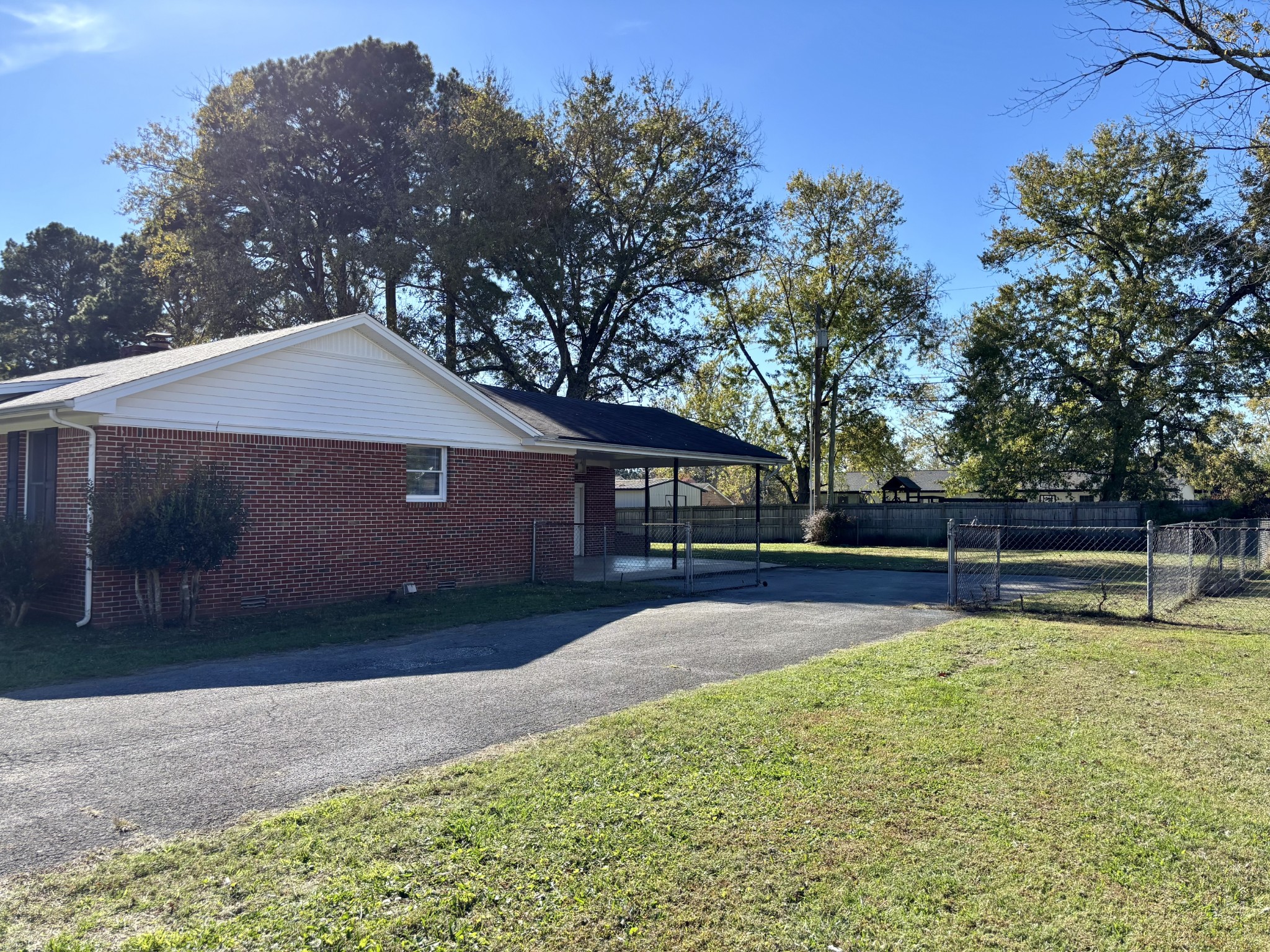 218 Greenfield Avenue Tullahoma, TN 37388 - Photo 12 of 14 a front view of house with yard and trees