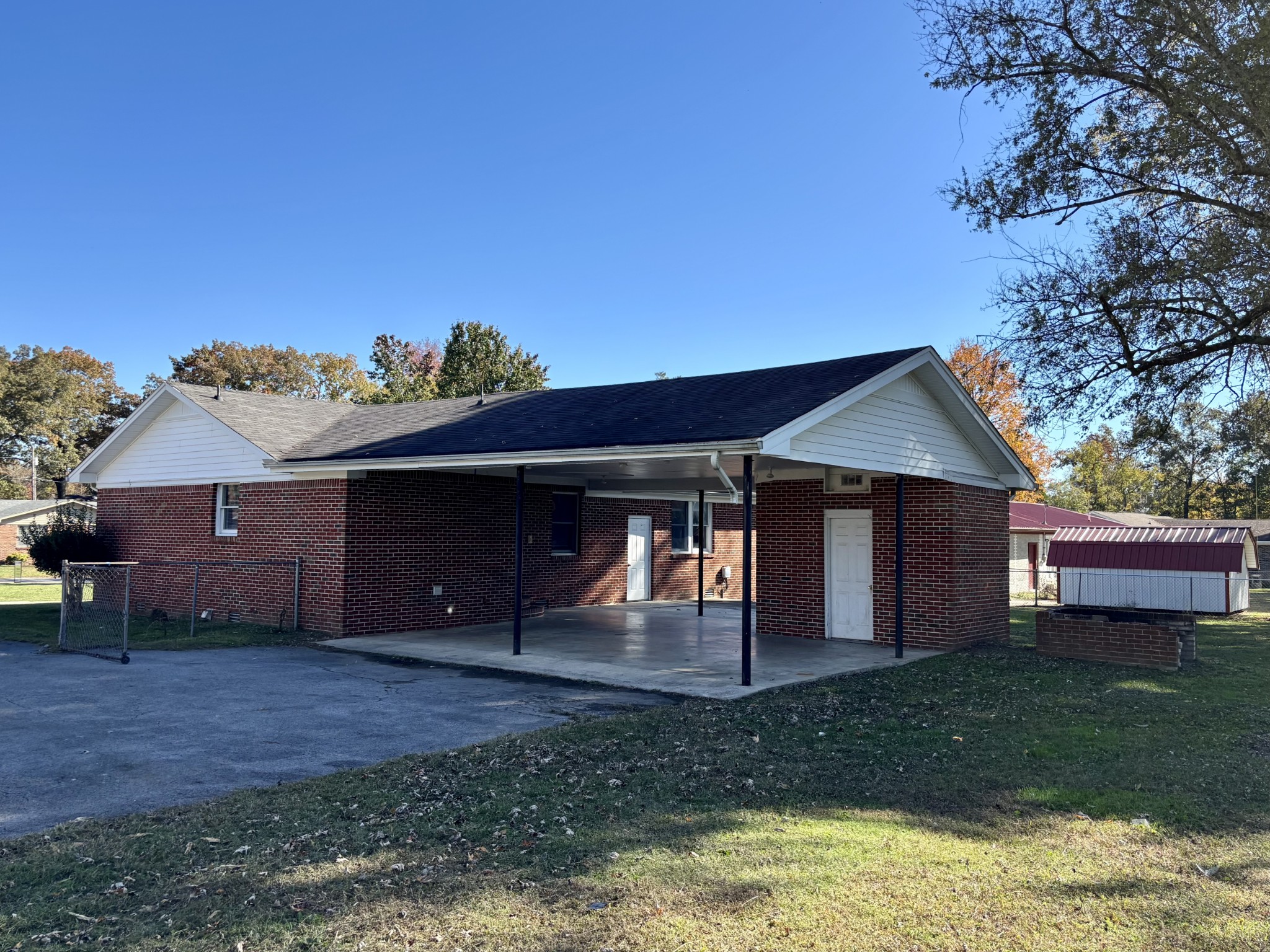 218 Greenfield Avenue Tullahoma, TN 37388 - Photo 13 of 14 a view of a house with a yard