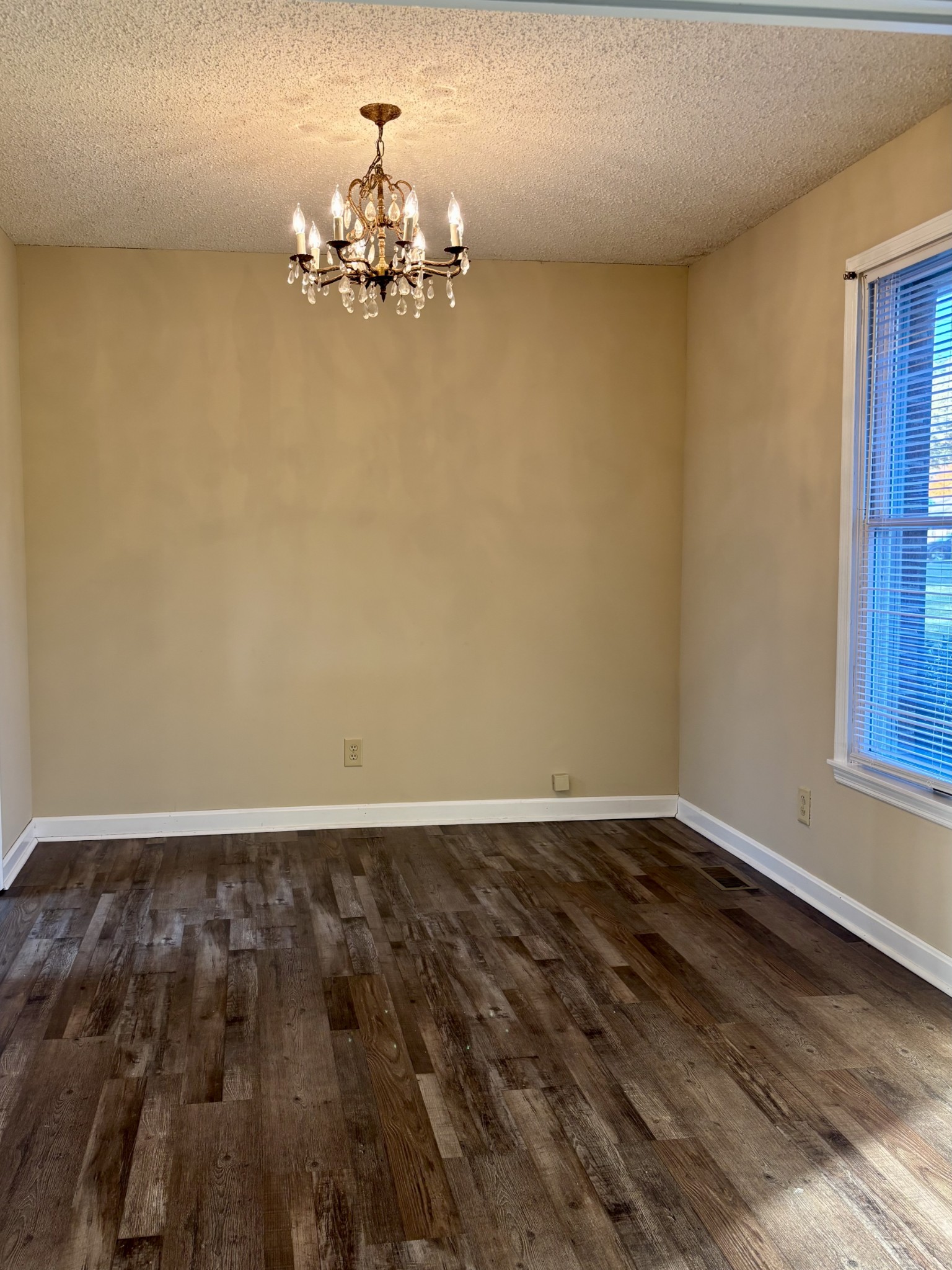 218 Greenfield Avenue Tullahoma, TN 37388 - Photo 5 of 14 wooden floor in a empty room