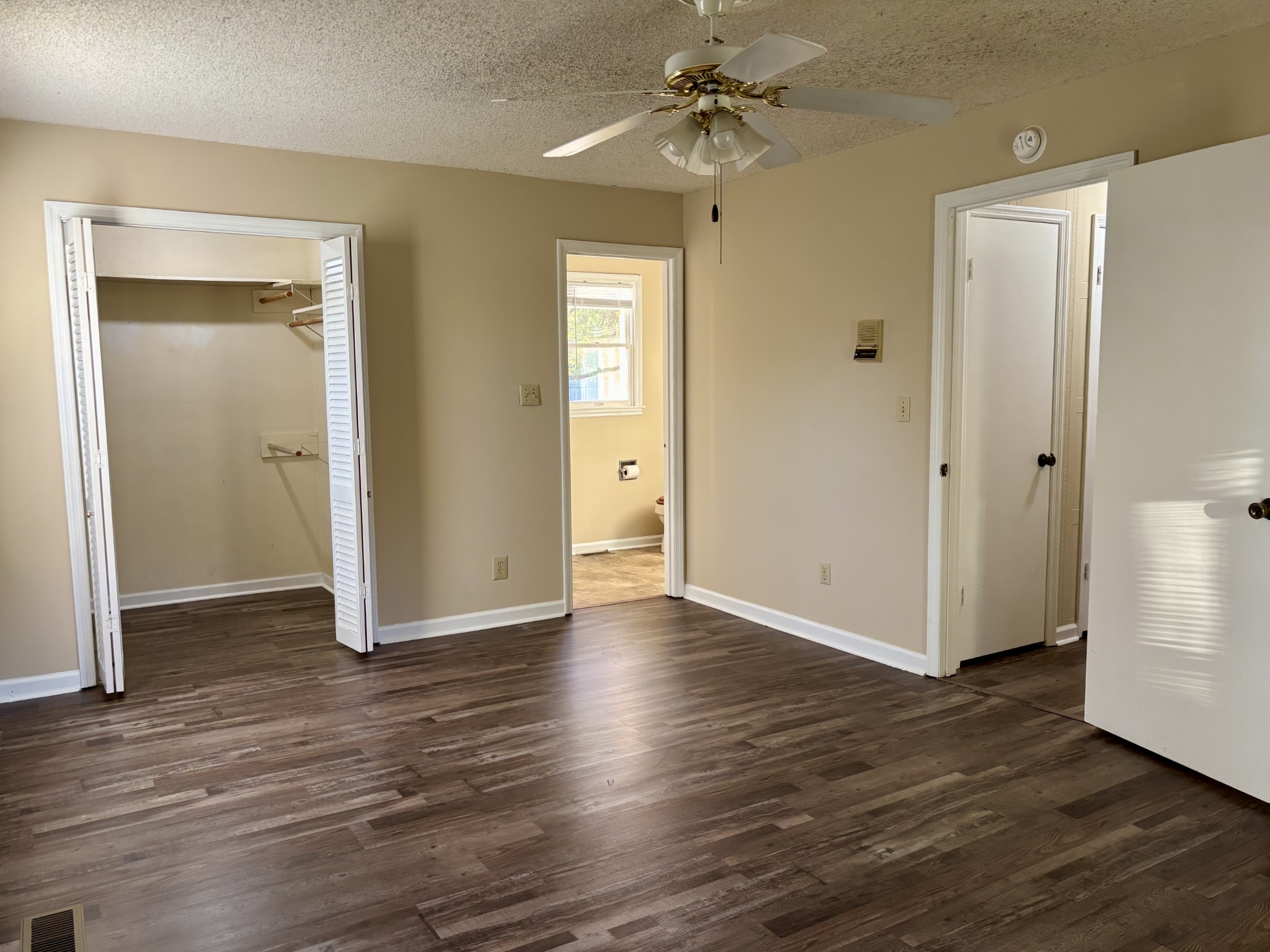 218 Greenfield Avenue Tullahoma, TN 37388 - Photo 6 of 14 a view of a hallway with wooden floor and closet area