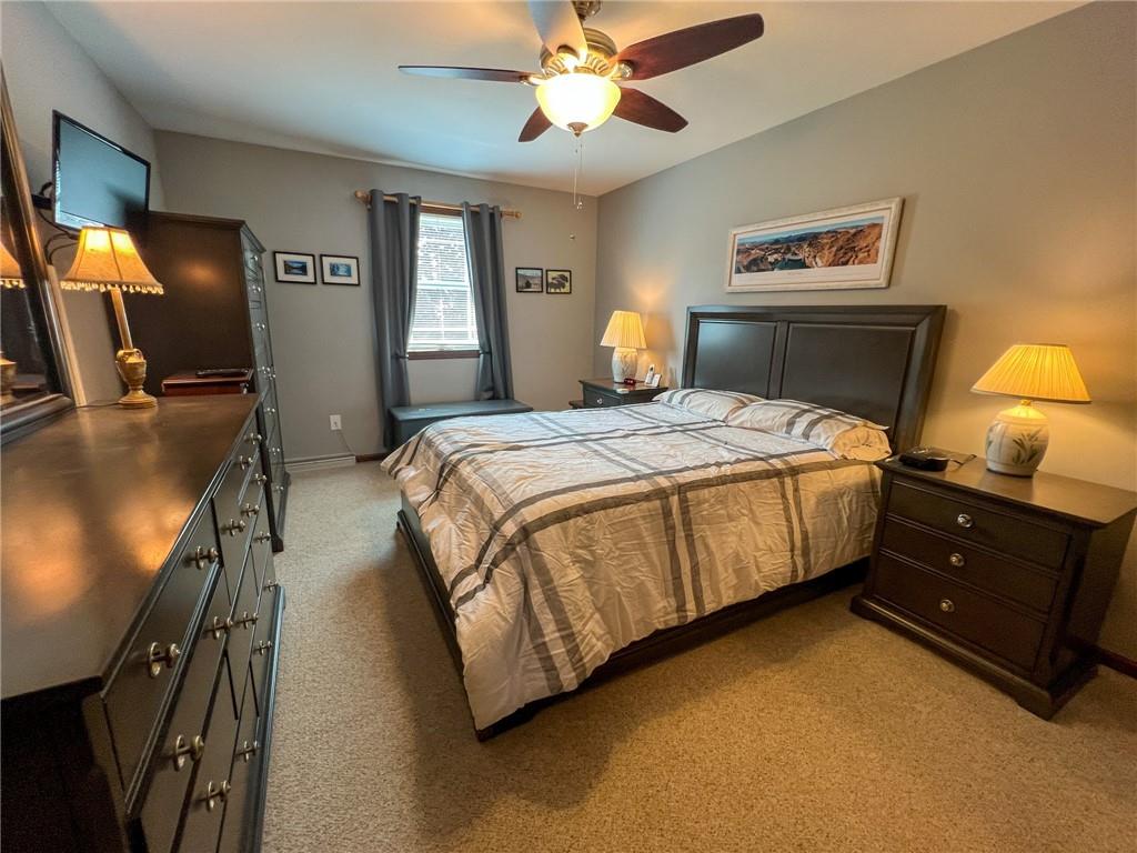 100 Marion Drive Butler, PA 16001 - Photo 16 of 45 a bedroom with a bed and a chandelier