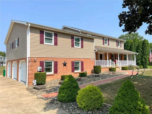 a house view with a garden space