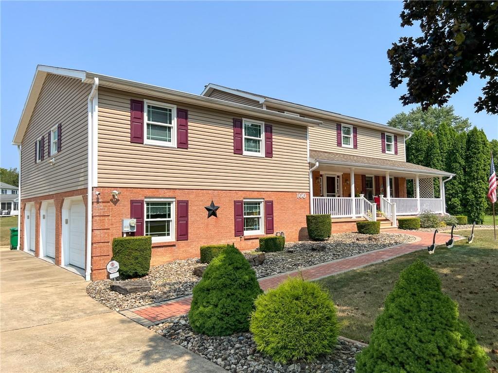 100 Marion Drive Butler, PA 16001 - Photo 2 of 45 a house view with a garden space