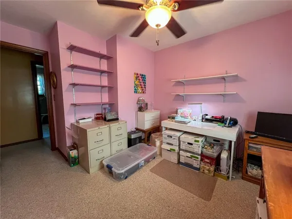 a kitchen with a stove and cabinets