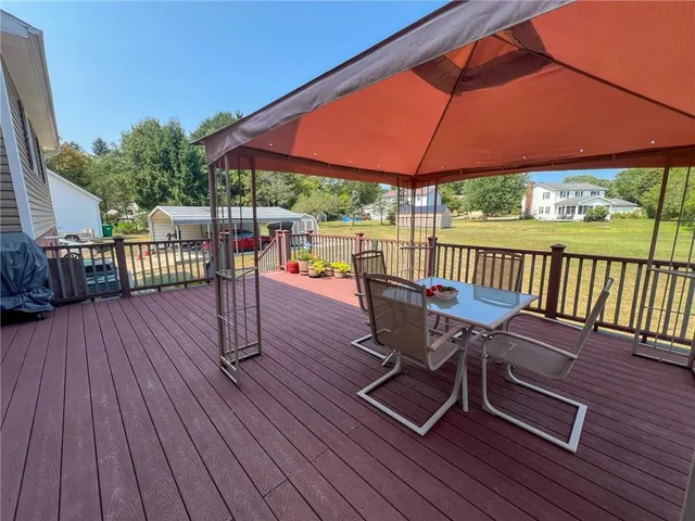 a view of a chairs on the roof deck